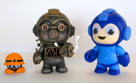 Steampunk Megaman and 8 bit Megaman Custom Vinyl Figures